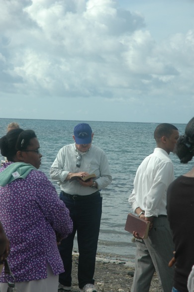 Bro. Larry reads the scripture for the baptisim